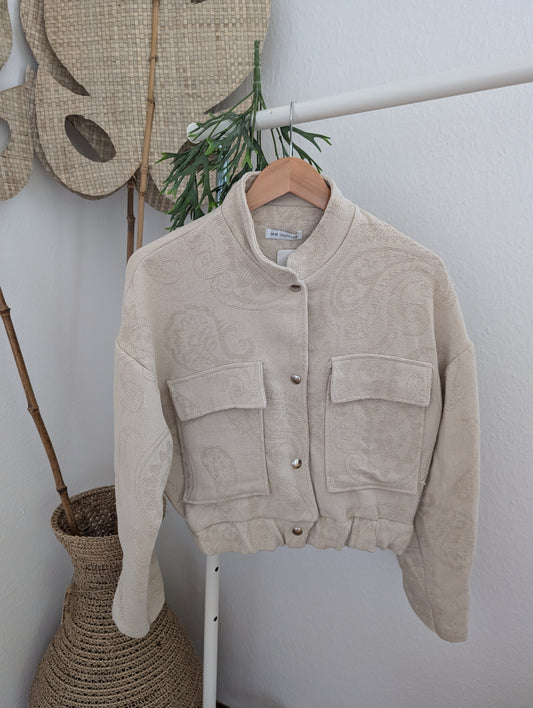 Beige jasje met mooie subtiele print One Size
